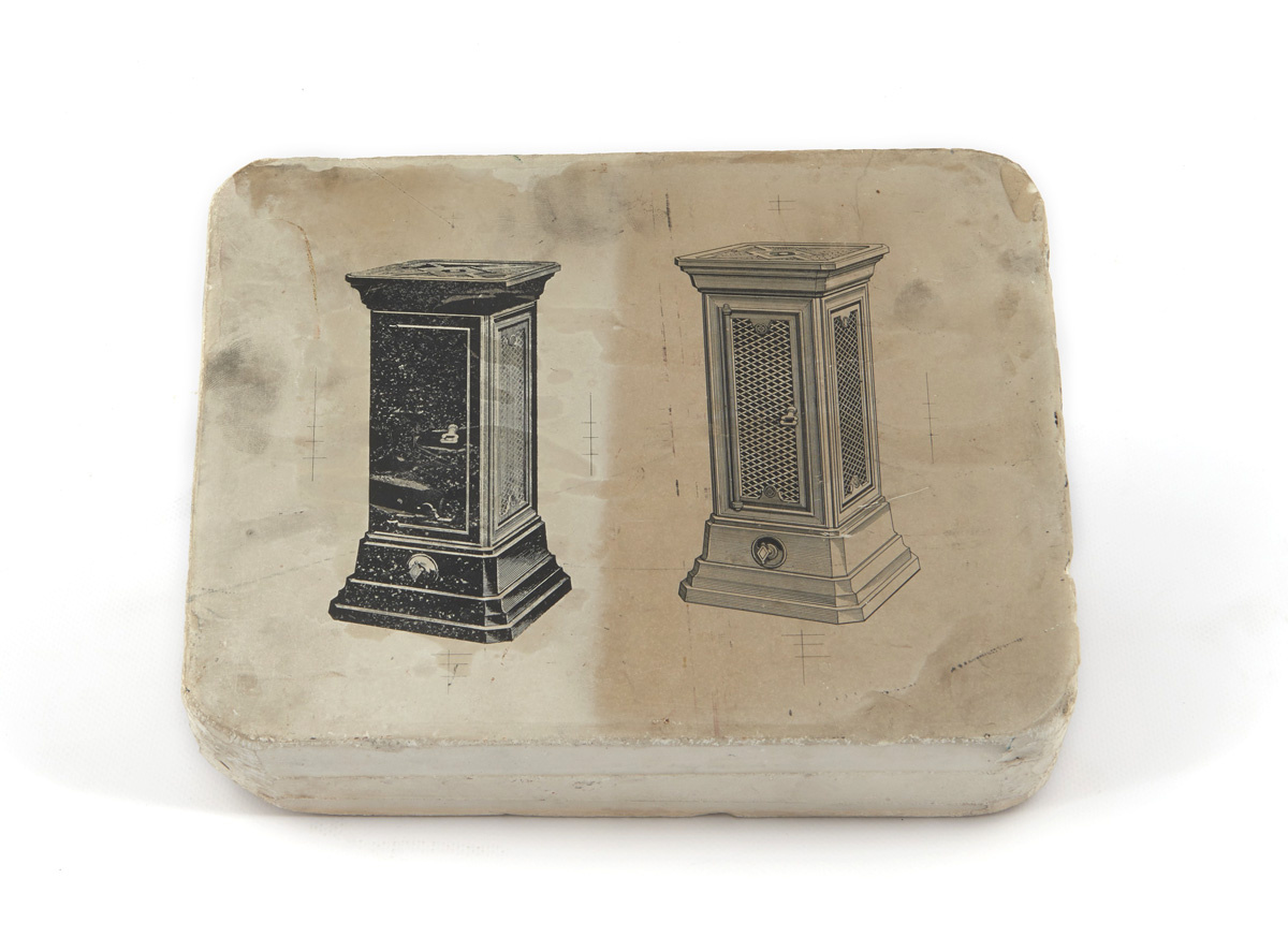 La pierre lithographique est ornée de deux dessins d'appareils de chauffage.