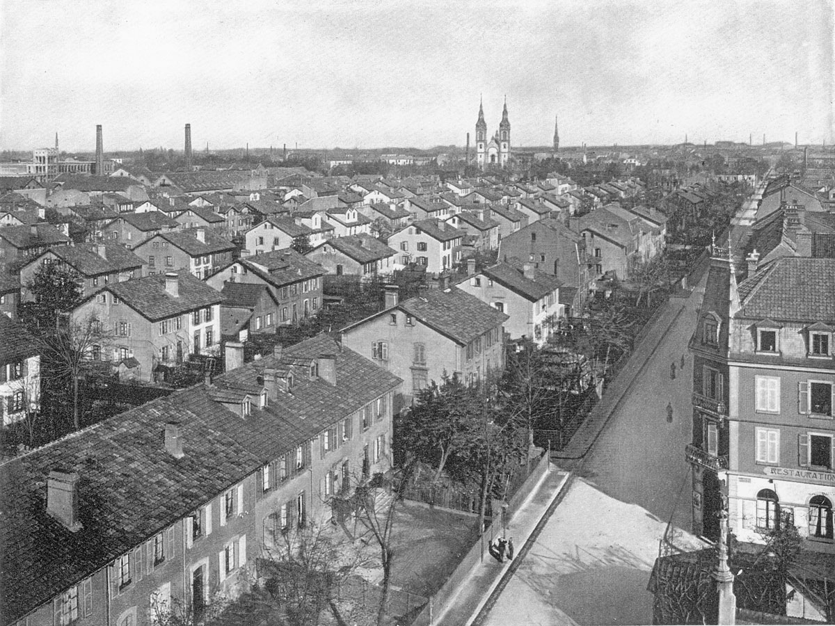 La photographie montre une partie des cités ouvrières de Mulhouse.