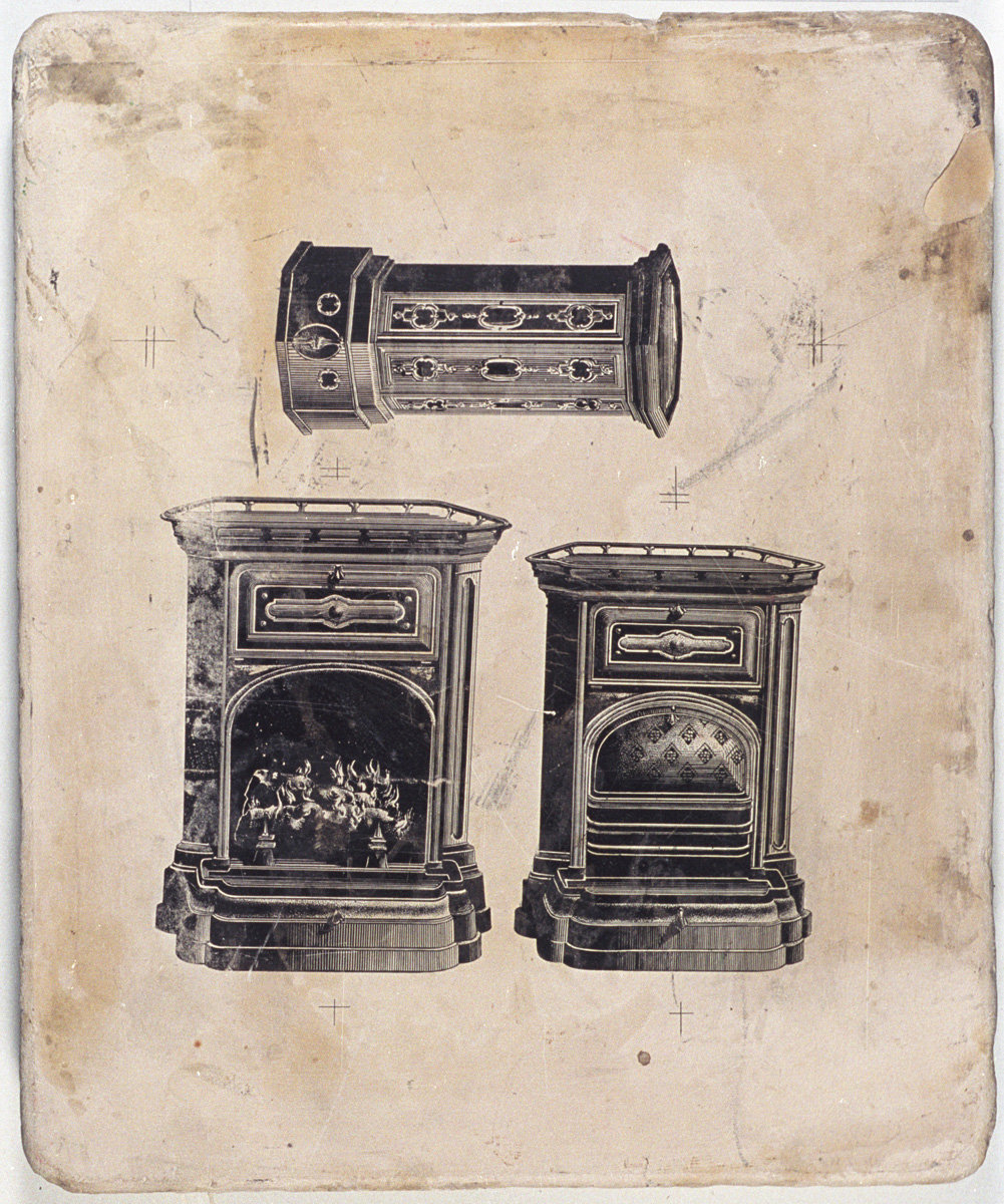 La pierre lithographique est ornée de dessins d'appareils de chauffage.